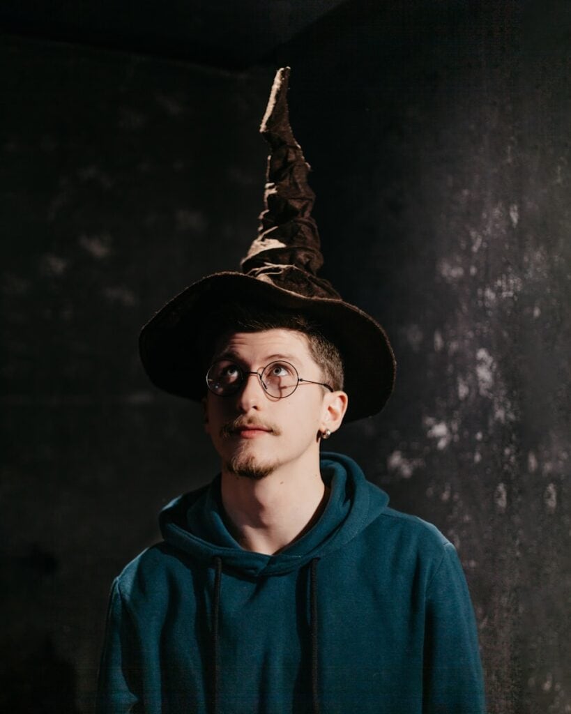 Photo by emrecan arık - Advertising Raleigh man in blue hoodie wearing black hat